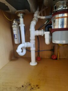 After view of an under-sink trap repair by Virtual Plumbing Assistant